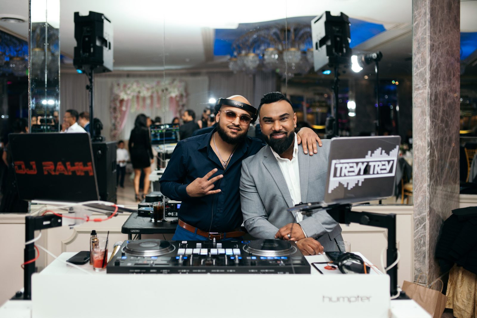 DJ Rahh and DJ Trevy Trev behind the white decks